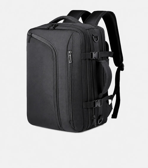 Black STOWD ONE travel backpack shown from an angle